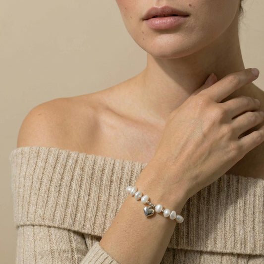 pearl bracelet with a heart charm