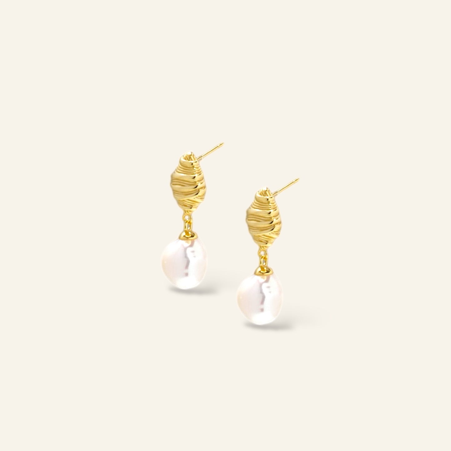 Gold earrings with pearl drops