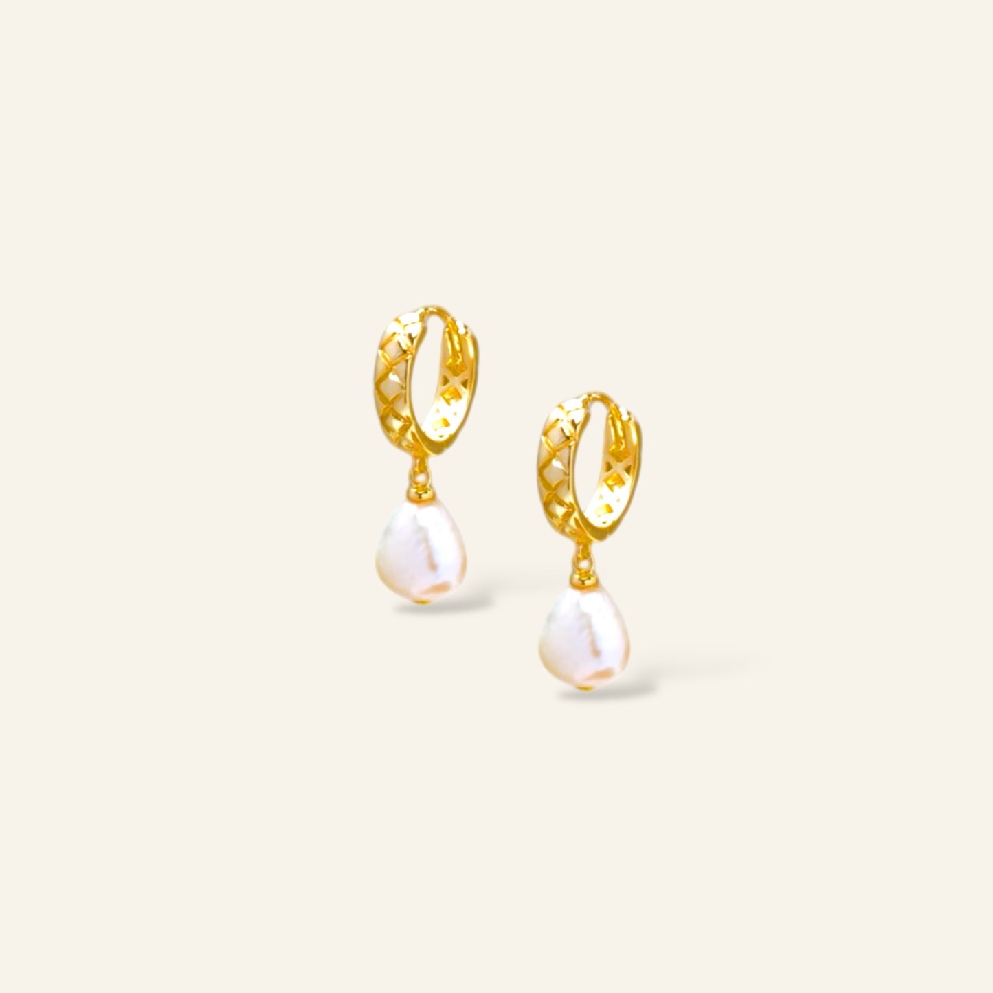 Gold hoop earrings with pearl drops