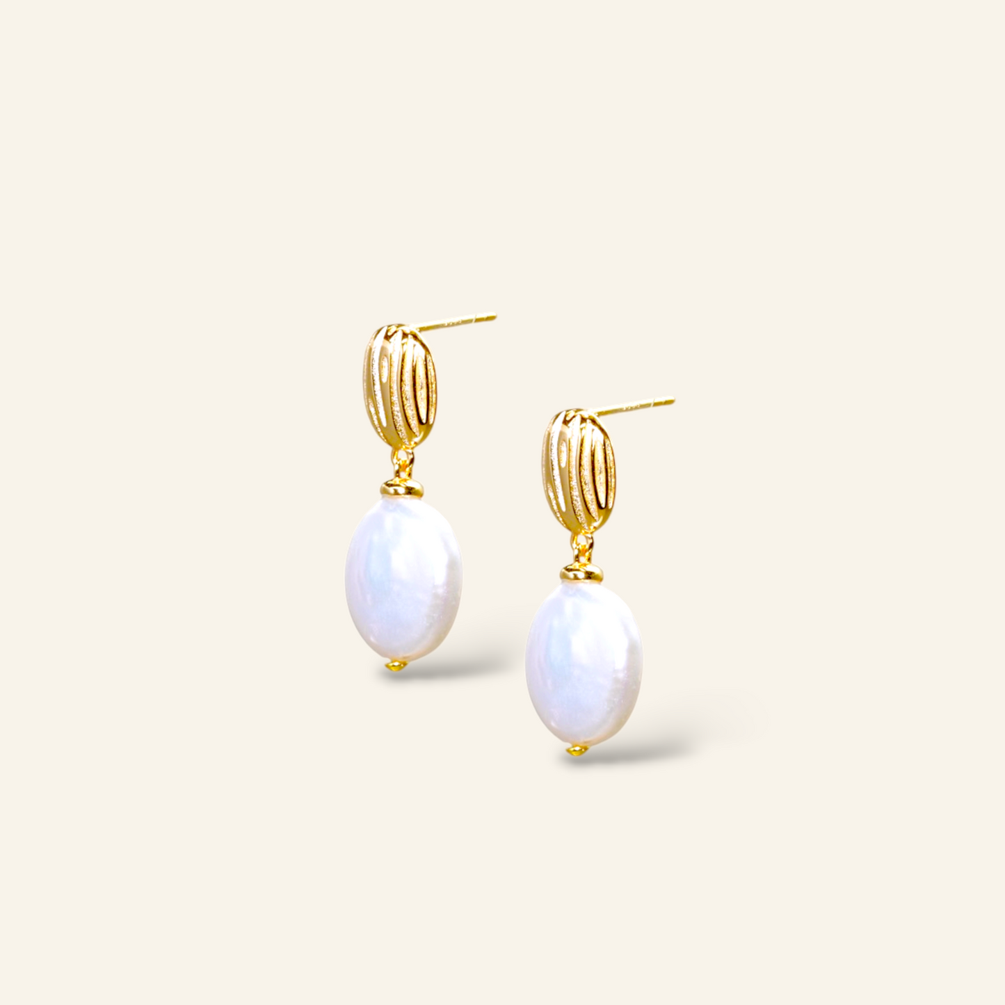 Gold earrings with white pearl