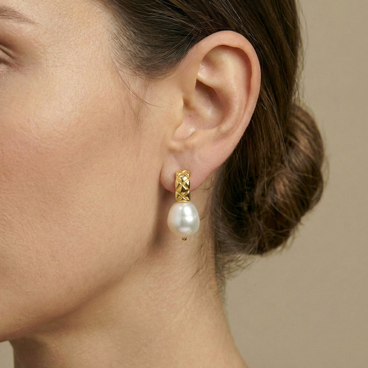 Close-up of a pearl earring