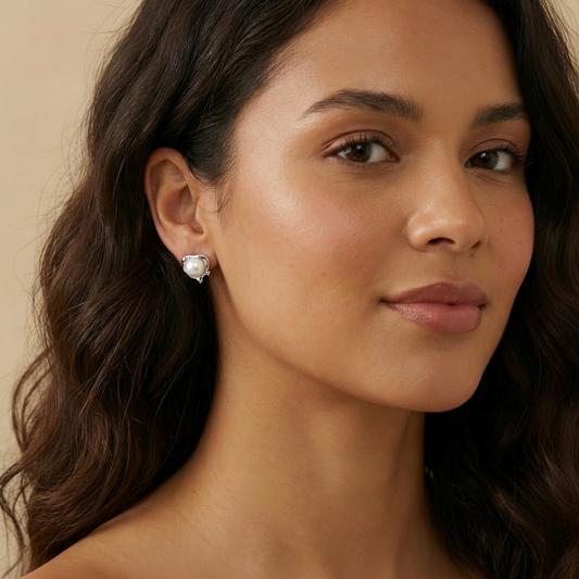 silver earring with a pearl