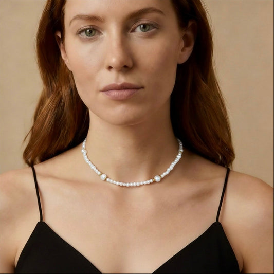 Woman wearing a pearl necklace