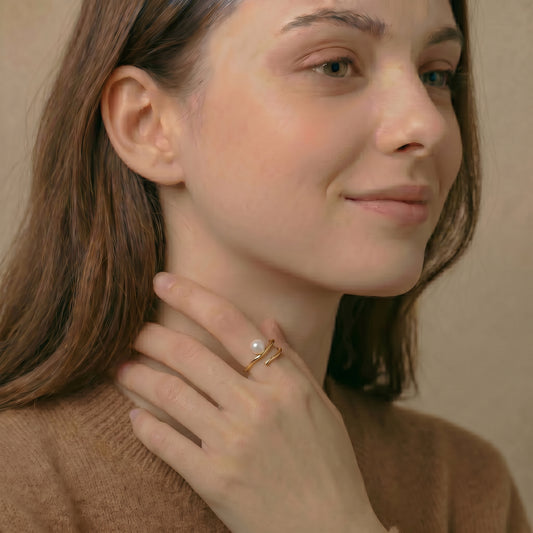 Woman wearing a pearl ring