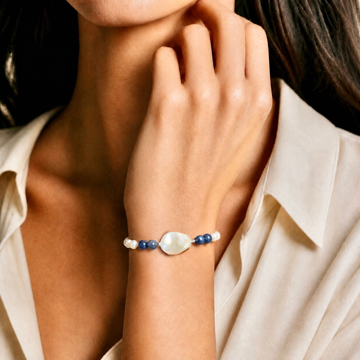 Baroque freshwater pearl bracelet with natural blue gemstones and  sterling silver.
