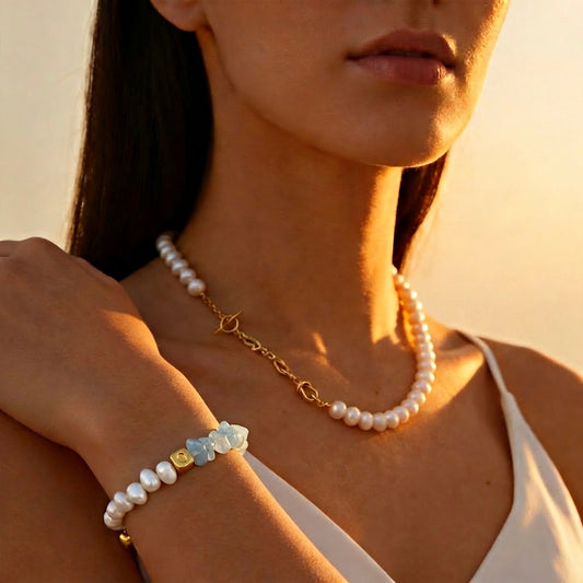 Woman wearing a pearl necklace and bracelet 