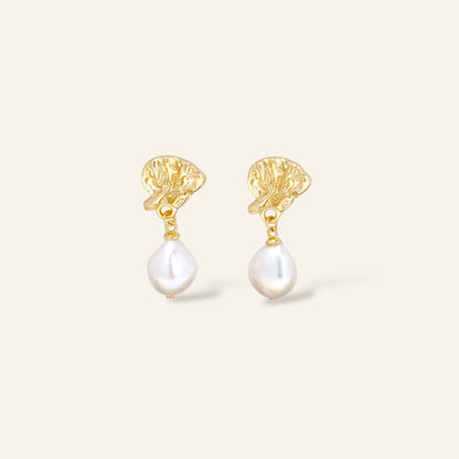 Gold earrings with pearl drops