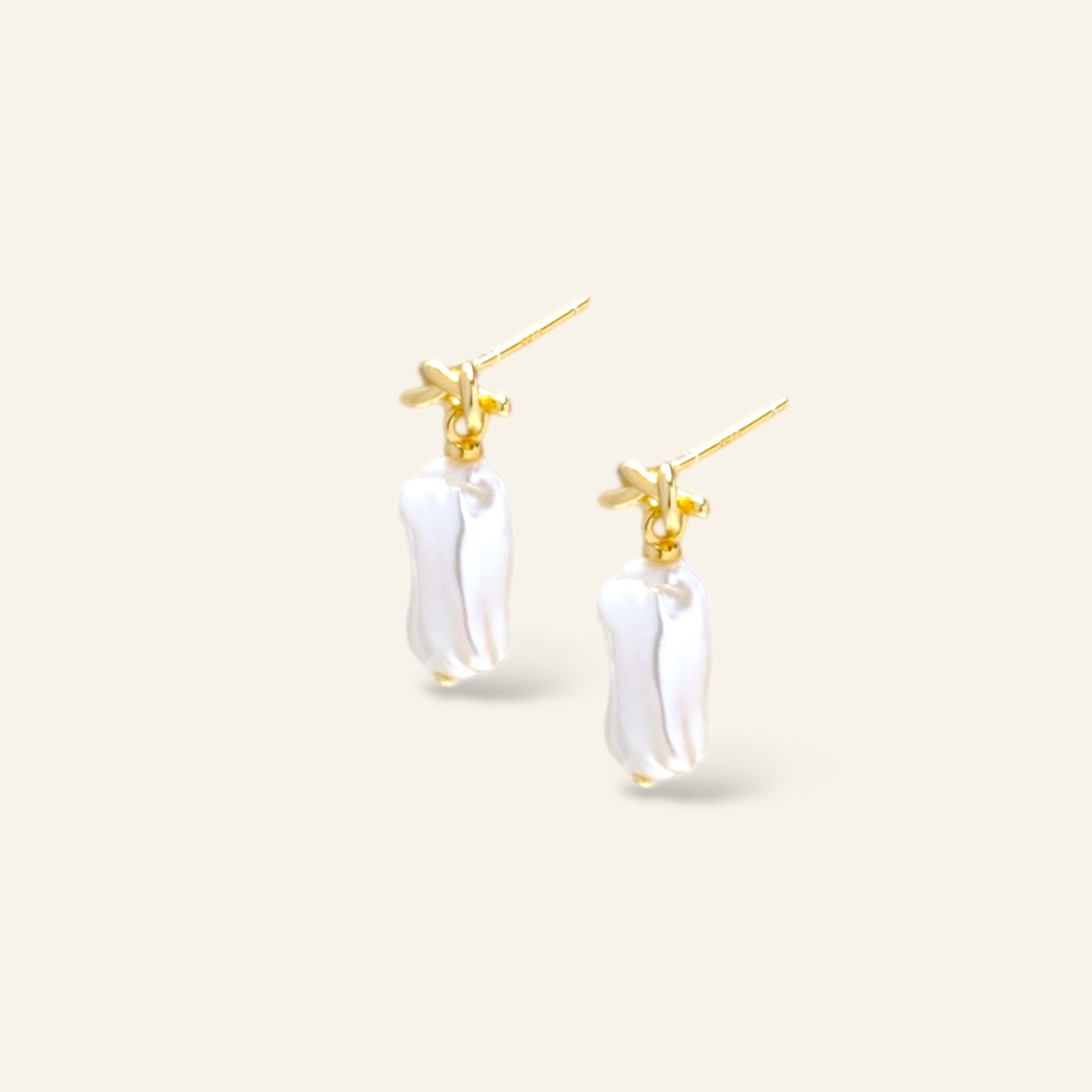 Pair of gold and white pearl earrings 