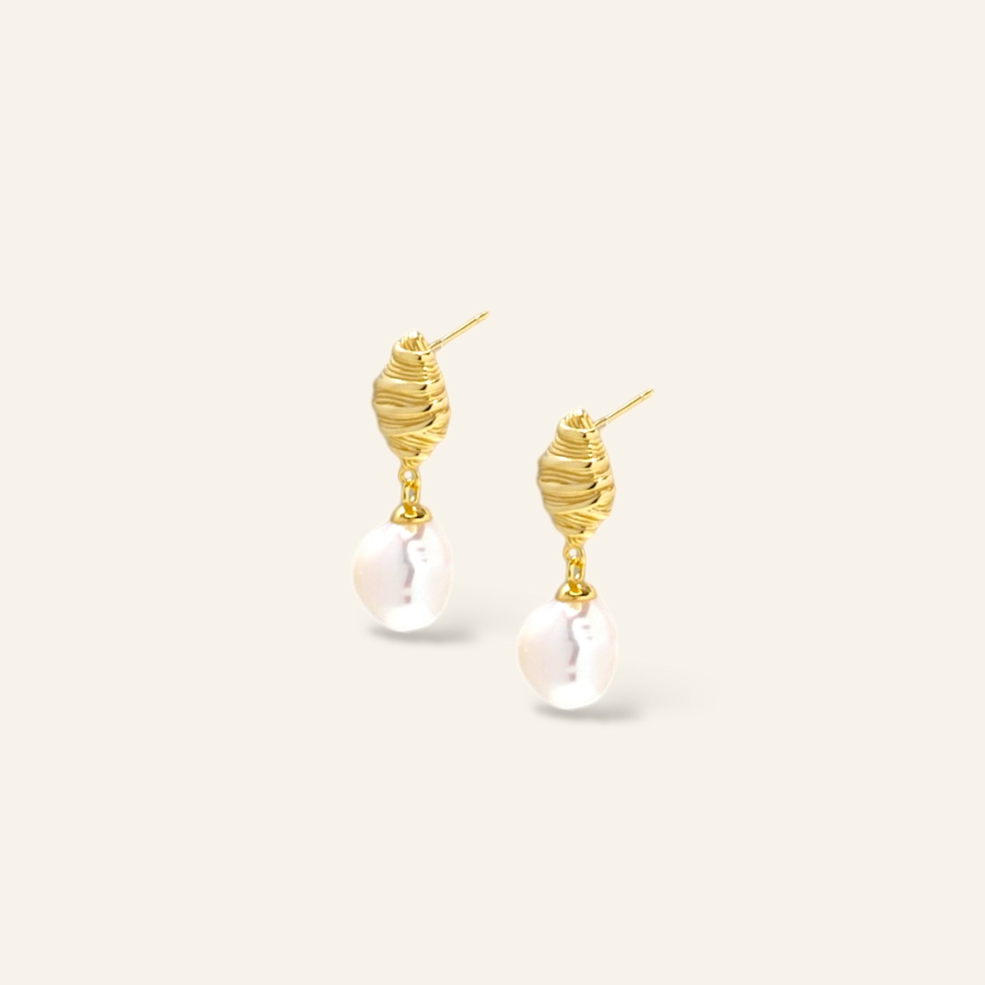 Gold earrings with pearl drops