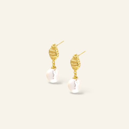Gold earrings with pearl drops