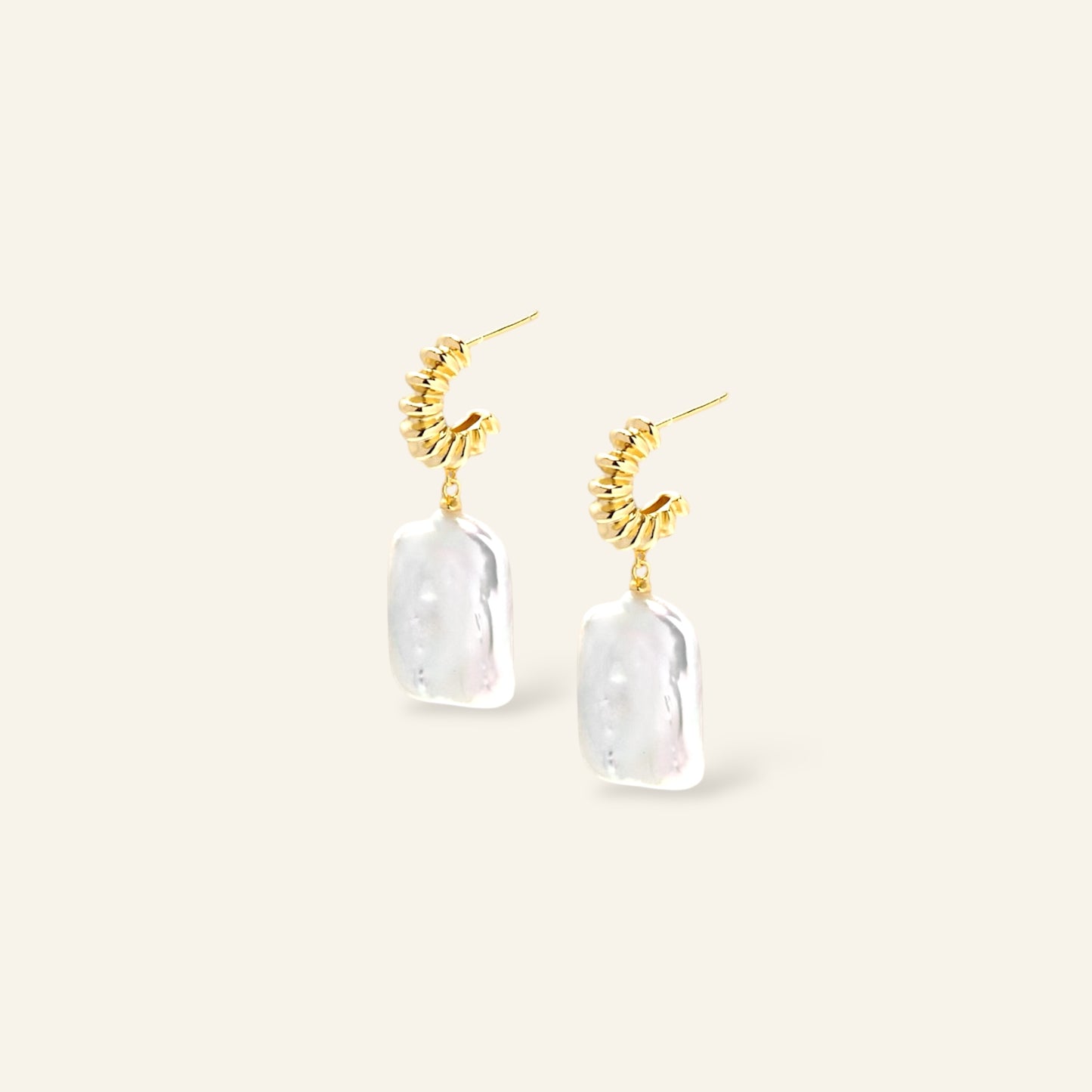 Gold earrings with pearl drops 