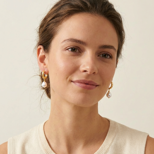 Woman wearing pearl earrings 