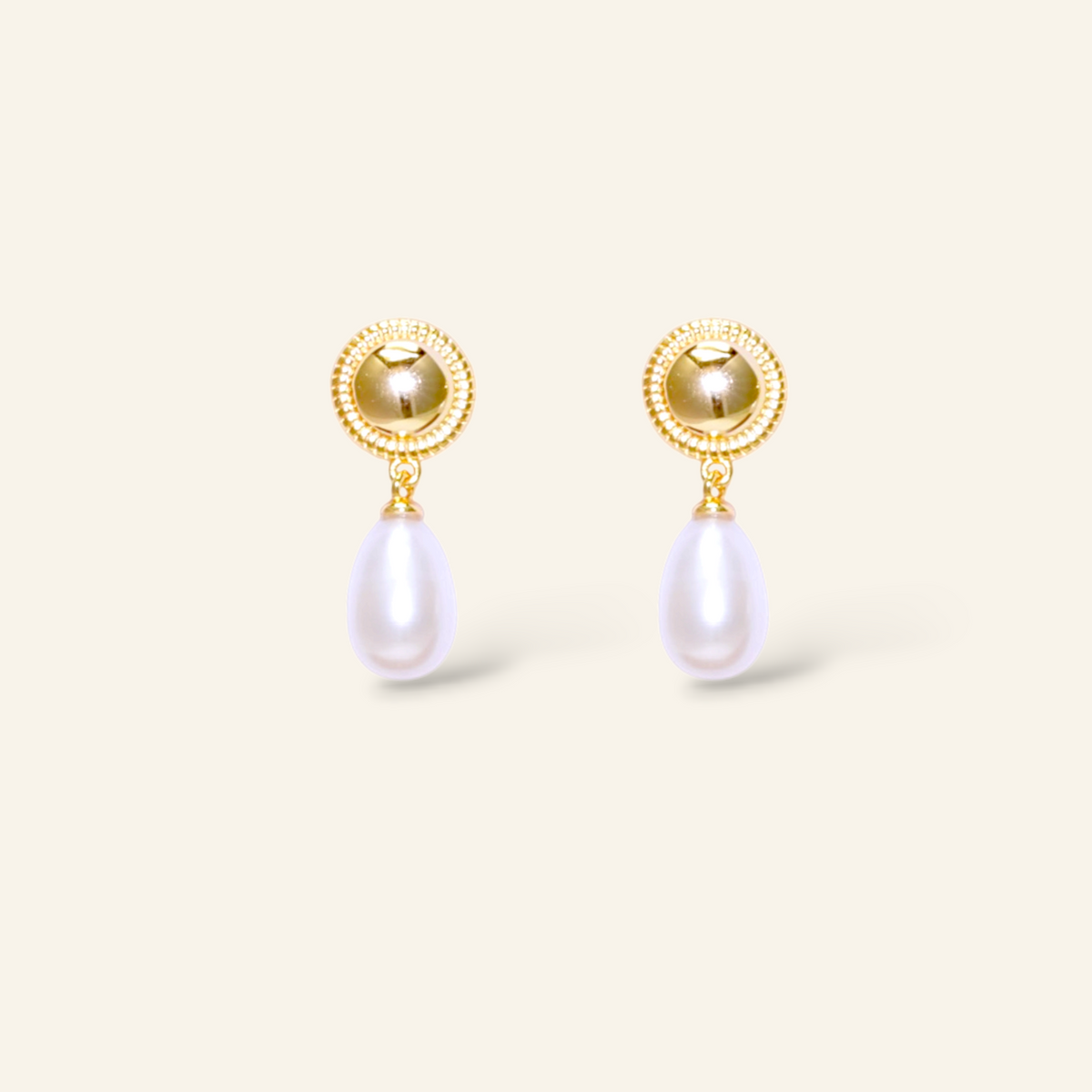 Solene pearl drop earrings in gold