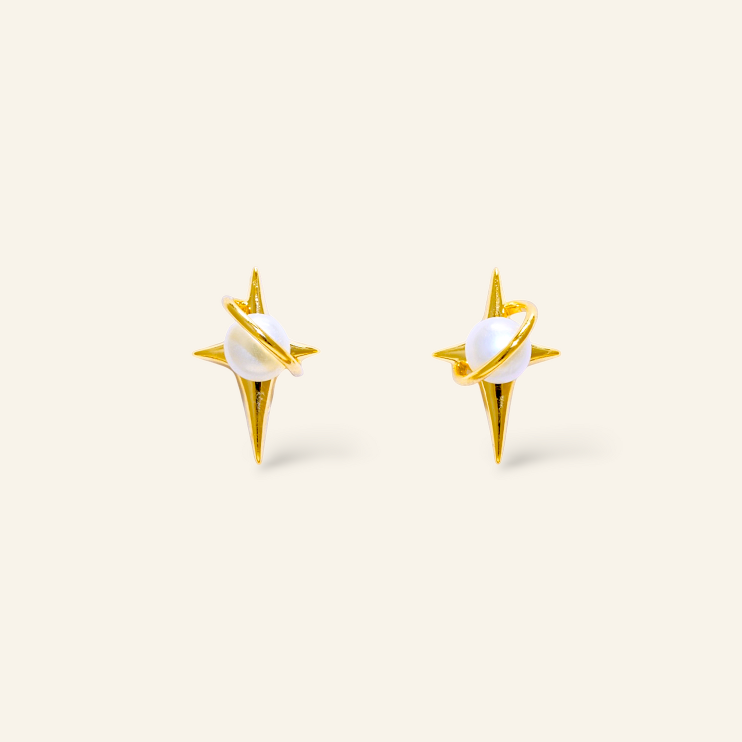 Gold earrings with a pearl