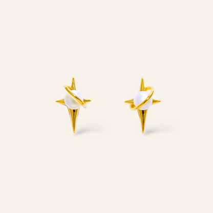 Gold earrings with a pearl