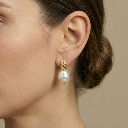 Close-up of a pearl earring 