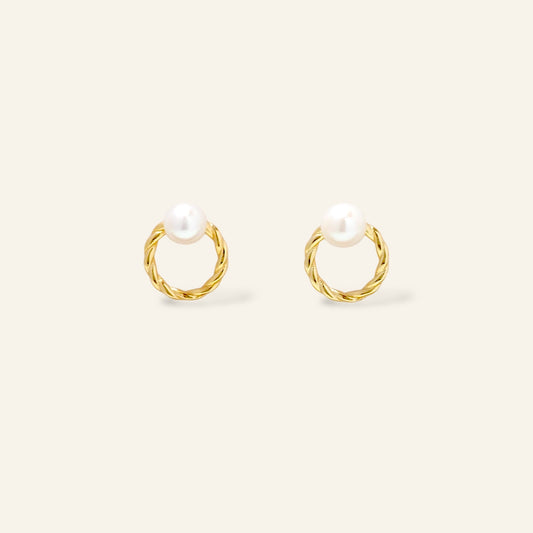 Pair of gold hoop earrings with pearls 