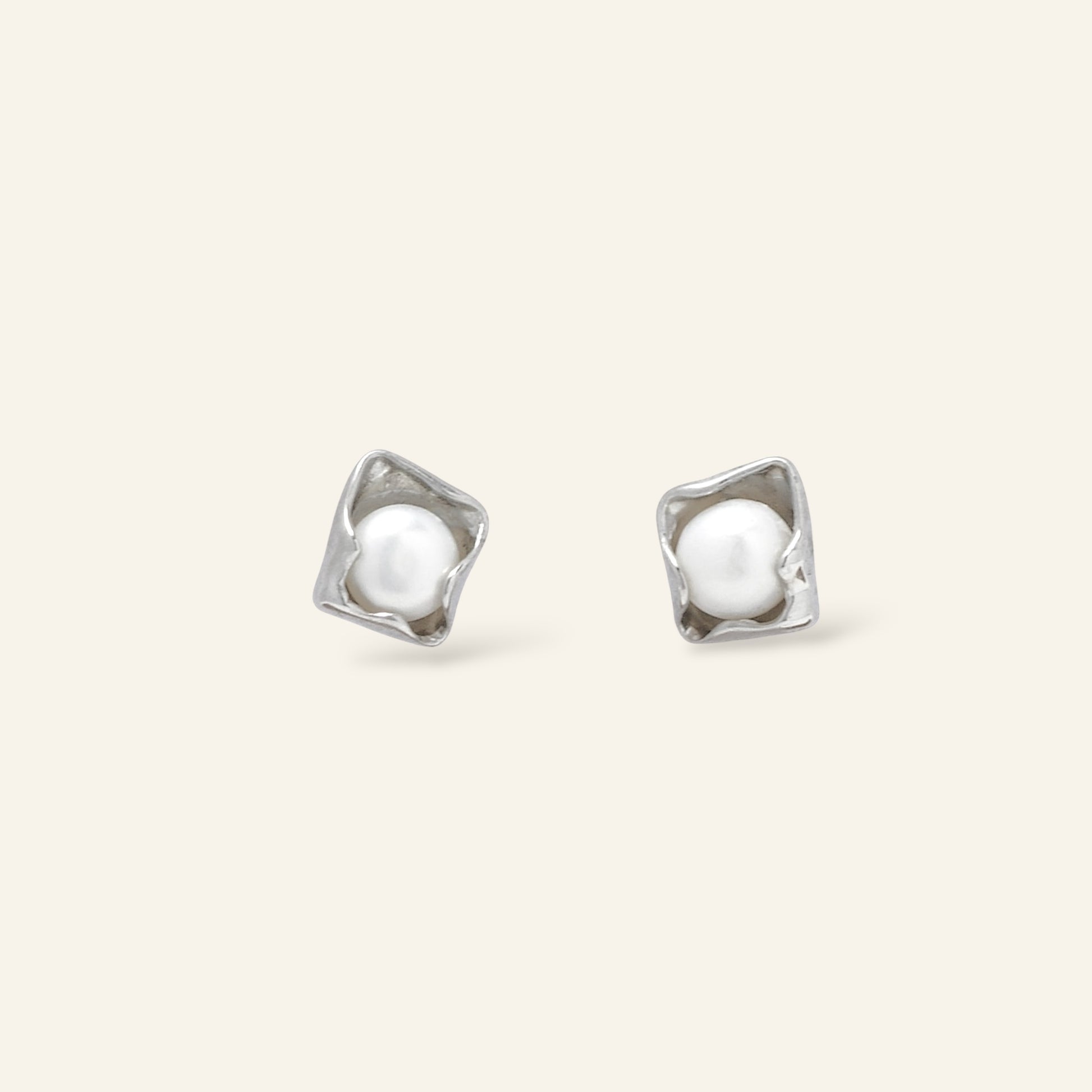silver earrings with white pearls 