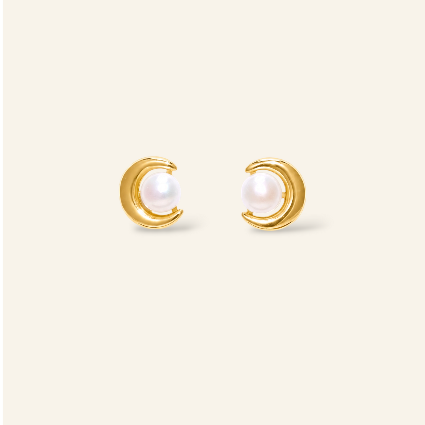 Gold earrings with pearl centers 