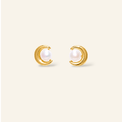 Gold earrings with pearl centers 
