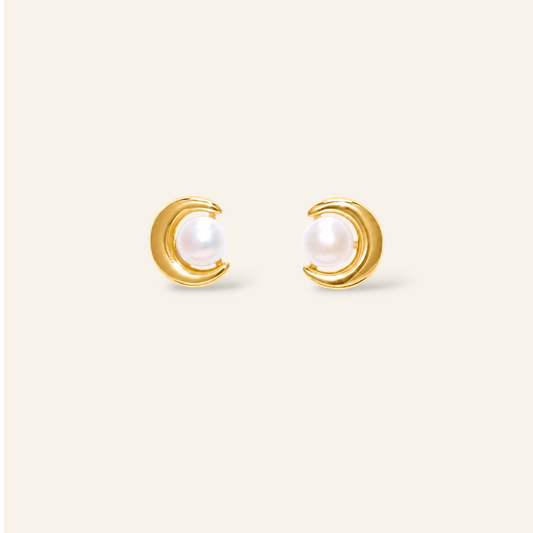 Gold earrings with pearl centers 