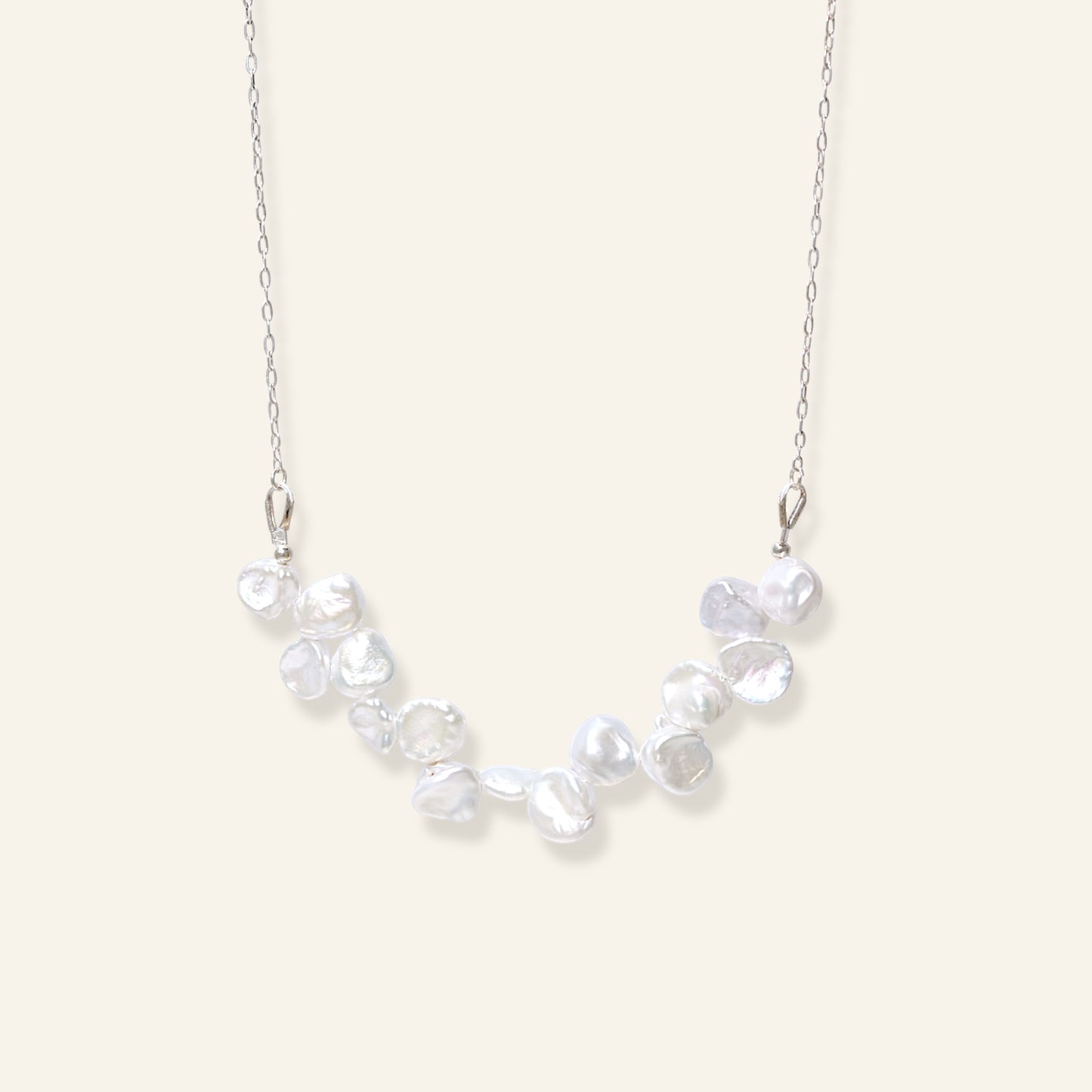 Pearl necklace on a white background