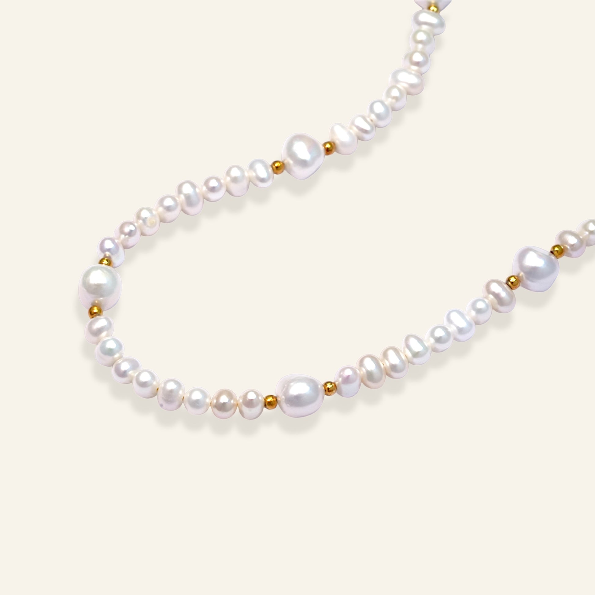 Pearl necklace with gold accents