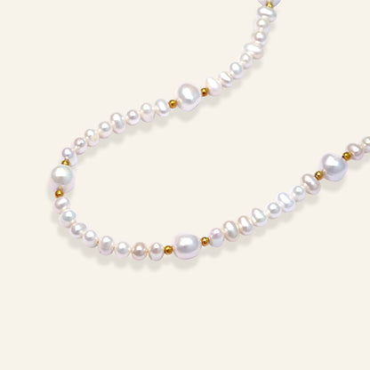 Pearl necklace with gold accents