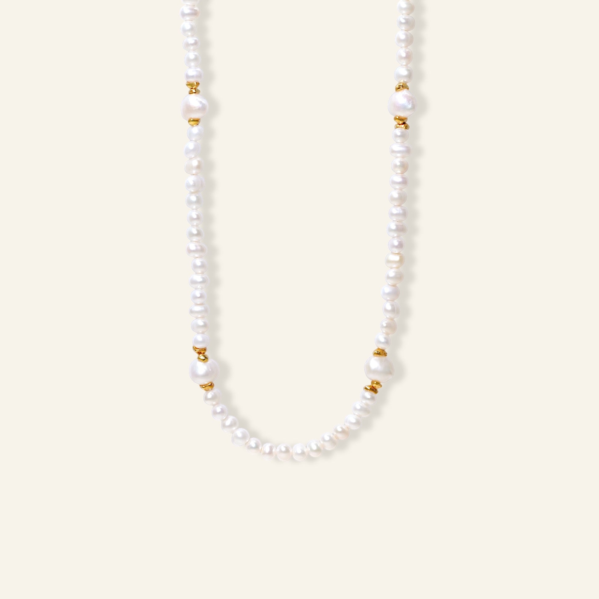 Pearl necklace with gold accents 
