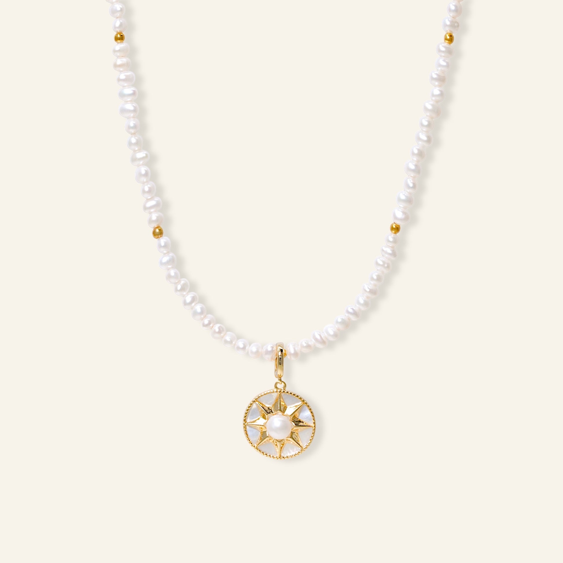 Pearl necklace with a gold pendant