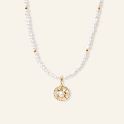 Pearl necklace with a gold pendant