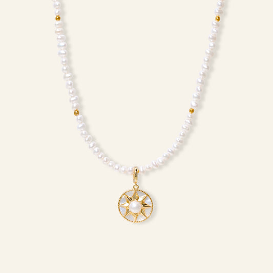 Pearl necklace with a gold pendant