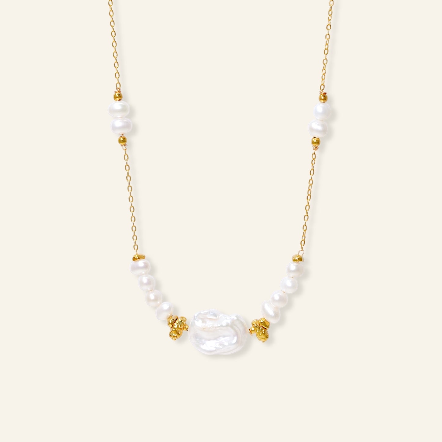 Pearl necklace with gold accents 