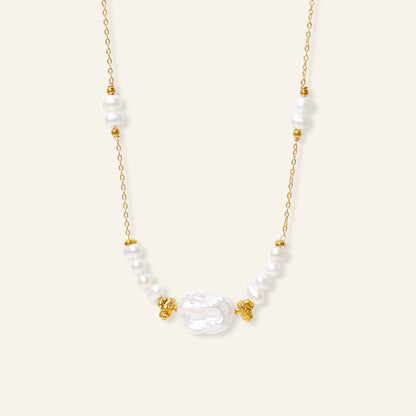 Pearl necklace with gold accents 