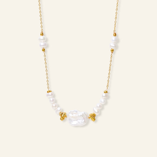 Pearl necklace with gold accents 