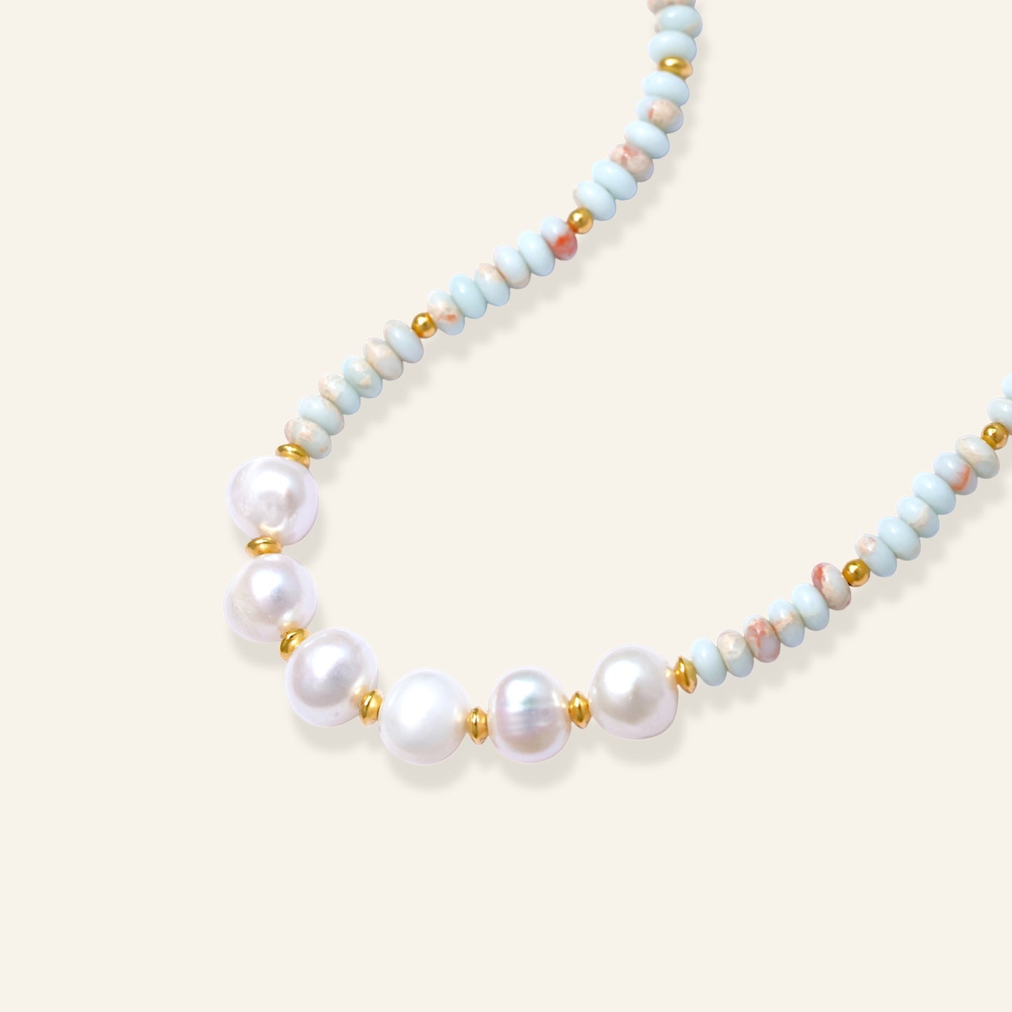 Necklace with pearls and blue beads
